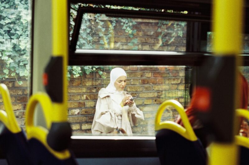https://unsplash.com/photos/a-nun-is-sitting-on-a-bus-looking-out-the-window-8G_xTL45Dco?utm_source=unsplash&utm_medium=referral&utm_content=creditShareLink
