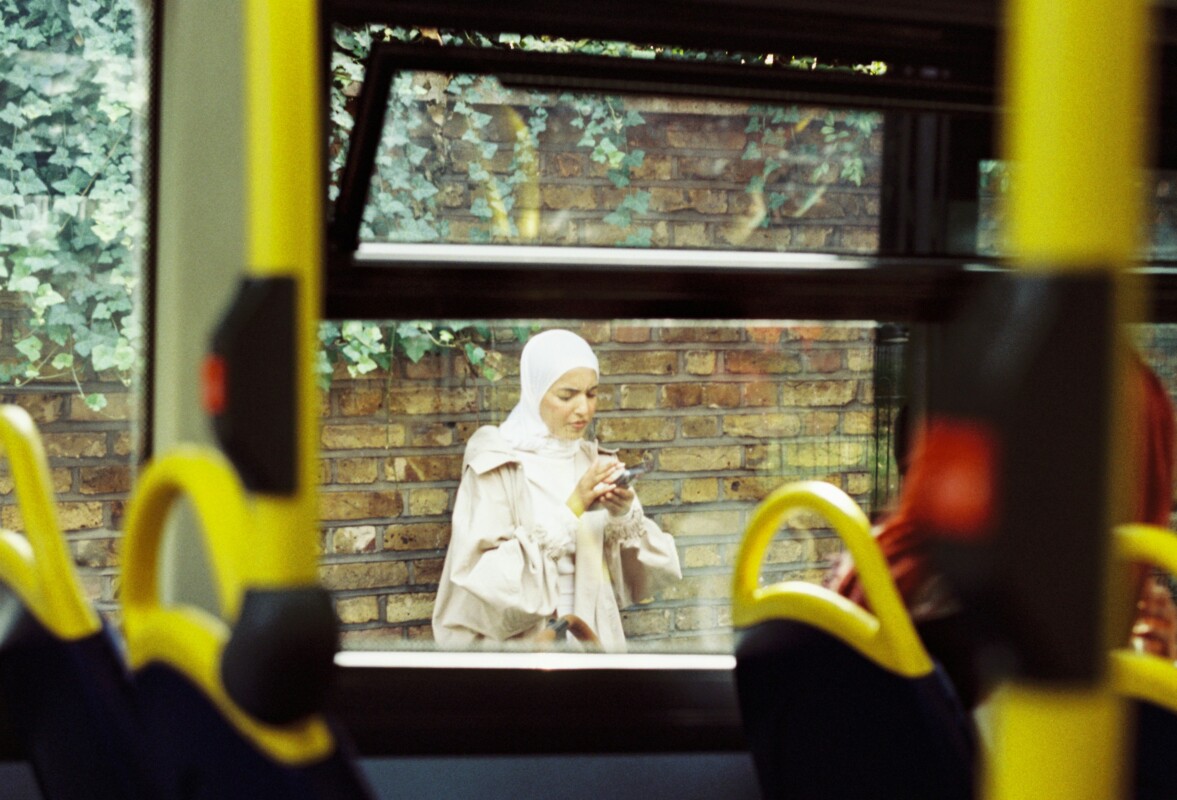 https://unsplash.com/photos/a-nun-is-sitting-on-a-bus-looking-out-the-window-8G_xTL45Dco?utm_source=unsplash&utm_medium=referral&utm_content=creditShareLink
