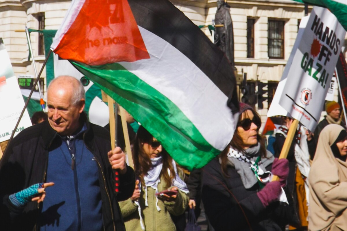 https://unsplash.com/photos/people-are-protesting-with-palestinian-flags-and-signs-eM2XG_PN2fE?utm_source=unsplash&utm_medium=referral&utm_content=creditShareLink